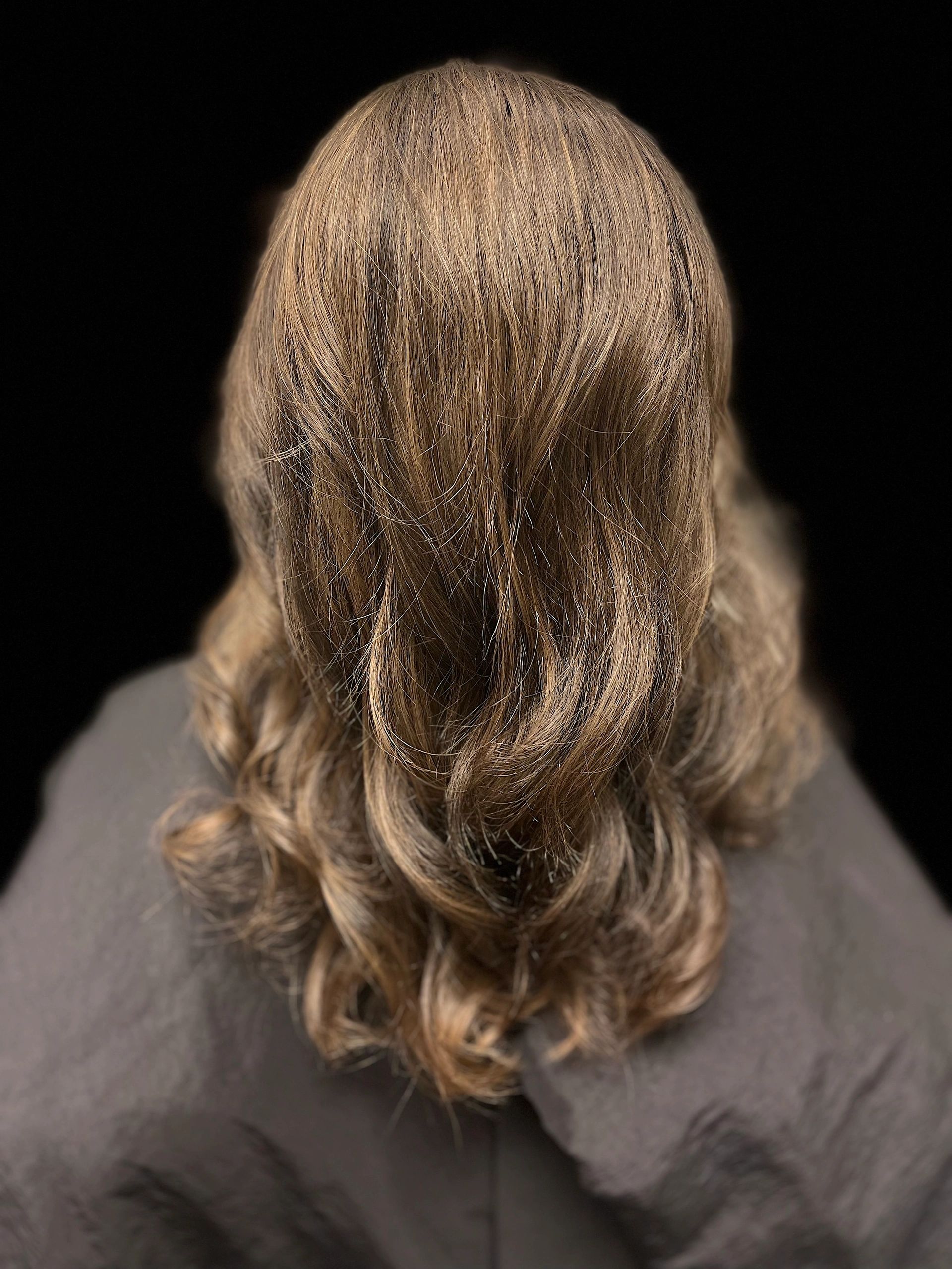 Long blonde hair rear view